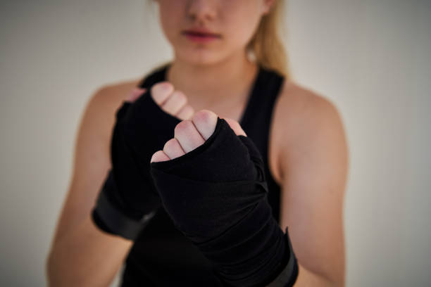 istock Young woman boxing 1187264624