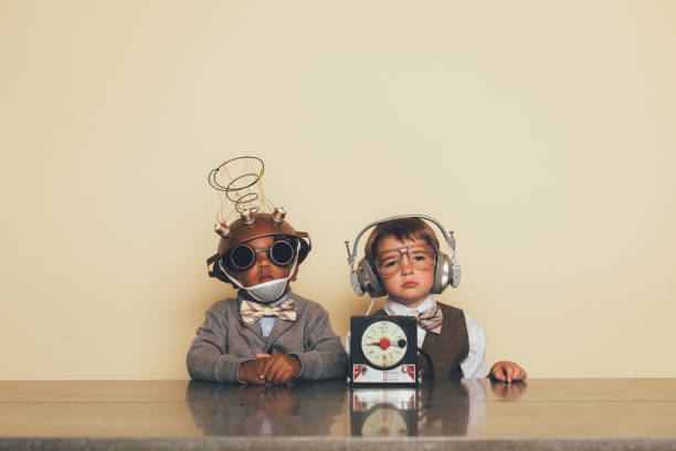istock Young Boys with Mind Reading Invention 1187265027