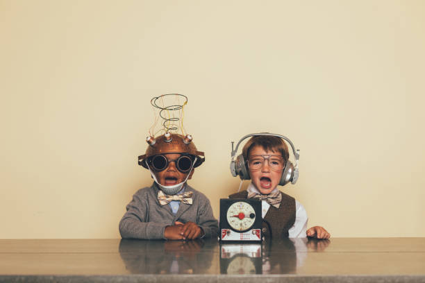 istock Young Boys with Mind Reading Invention 1187265035