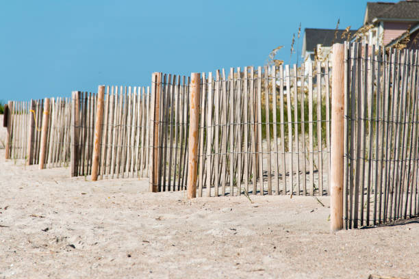 istock Wooden fence on a beach 1187265788