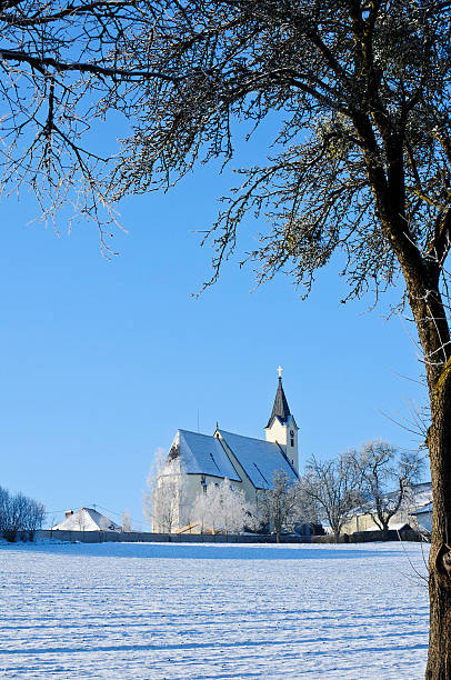 istock Austrian Church in Winter Landscape 118726792