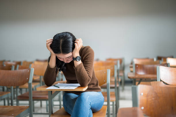 istock Female students taking tests at the university 1187268933