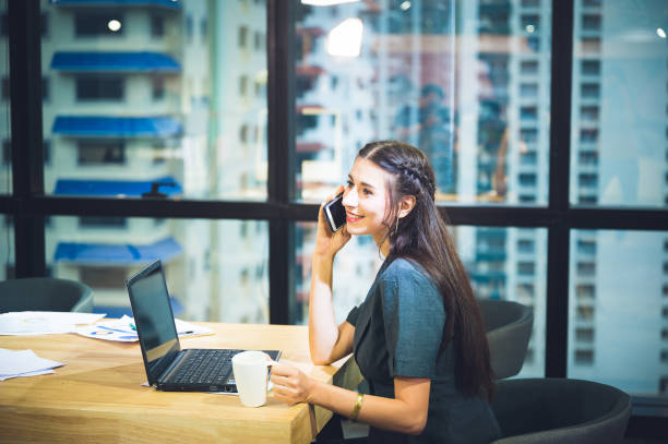 istock businesswomen using smartphone   morning with coffee cup 1187280804