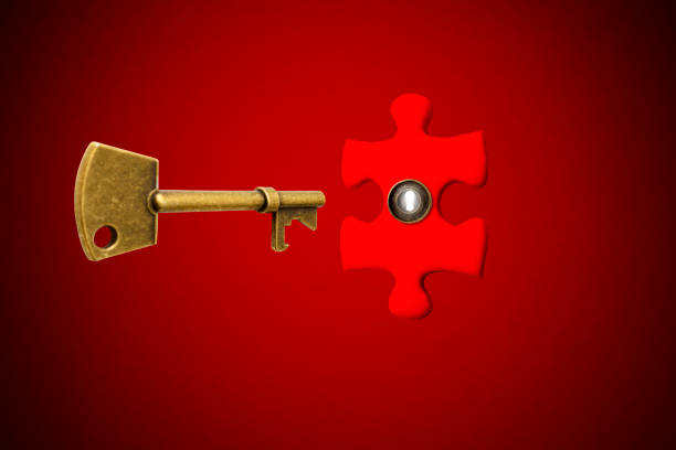 inserimento di una chiave di scheletro antica nel buco della serratura di un puzzle rosso - business relationship skeleton key key puzzle foto e immagini stock