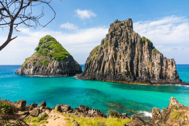 View of the Morro dos Dois Irmãos in Fernando de Noronha, Brazil Fernando de Noronha is a paradisiac tropical island off the coast of Brazil two brothers mountain stock pictures, royalty-free photos & images