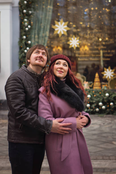 istock Lovers walk at the christmas market 1187286699