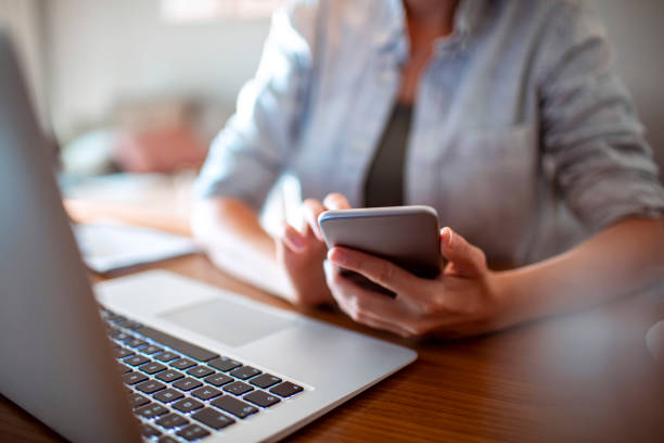 istock Woman using a Phone 1187289223