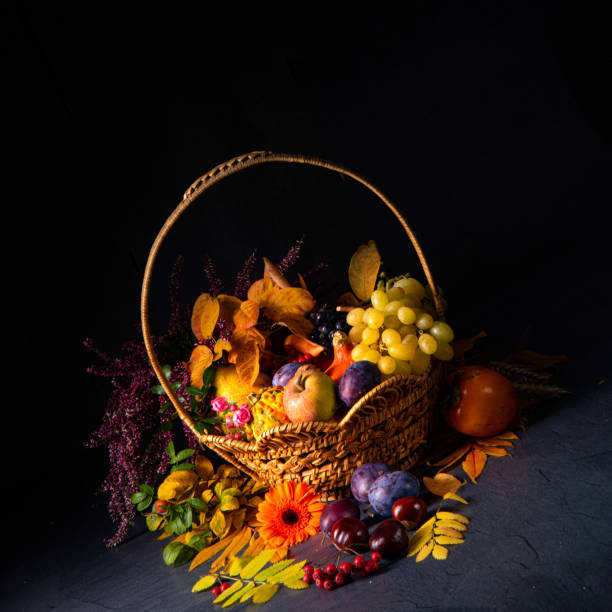 istock autumnal cornucopia in round basket 1187289306