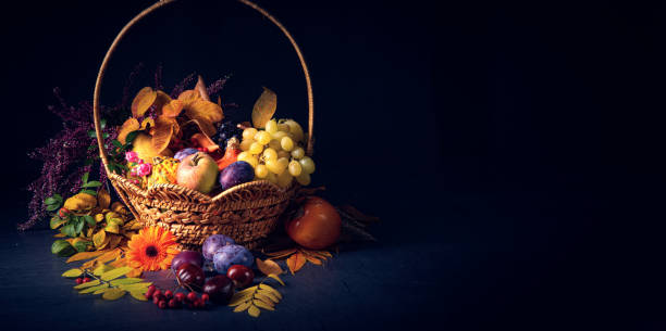 istock autumnal cornucopia in round basket 1187289373