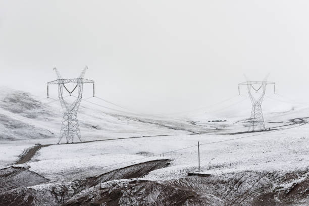istock electricity pylon on mountain which covered with snow 1187290286