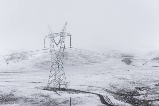 istock electricity pylon on mountain which covered with snow 1187290306