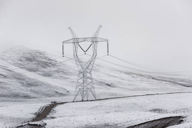 istock electricity pylon on mountain which covered with snow 1187290345
