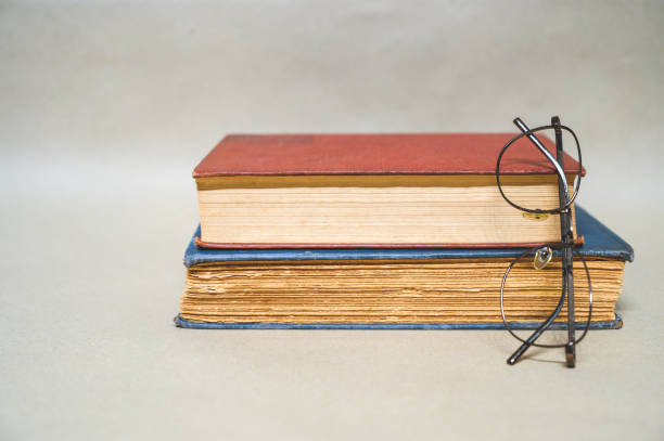 istock Old books placed on brown paper 1187291086