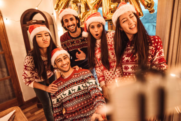 istock friends take a selfie at christmas 1187293203