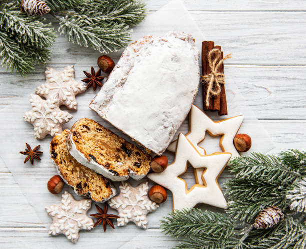 istock Christmas stollen on wooden background 1187295976