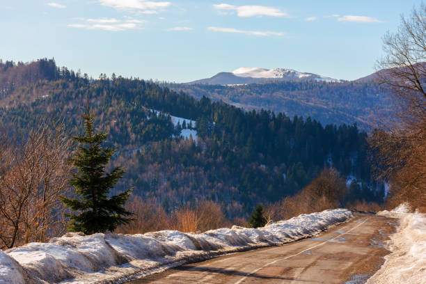 istock winding serpentine in winter mountains 1187299698