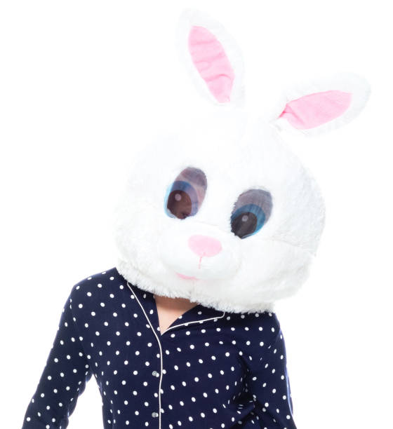 Front view / one person / waist up / portrait of 20-29 years old adult beautiful blond hair / long hair caucasian female / young women standing / dancing / exercising wearing mask - disguise / costume / pajamas / nightwear who is smiling / happy / cheerful / laughing / joy / humor / bizarre / cool attitude / wearing a rabbit mask vista frontal / una persona / cintura para arriba / retrato de 20-29 años adulto hermoso cabello rubio / pelo largo mujer caucásica / mujeres jóvenes de pie / bailando / haciendo ejercicio usando máscara - disfraz / traje / pijama / ropa de noche / act