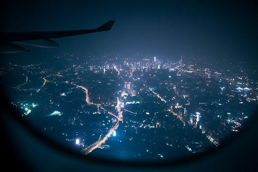 Looking guangzhou night through airplane window