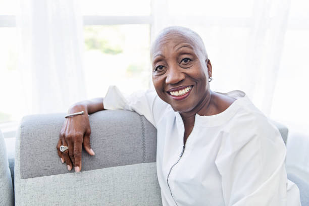 istock Senior Woman Relaxing on a Couch 1187311822