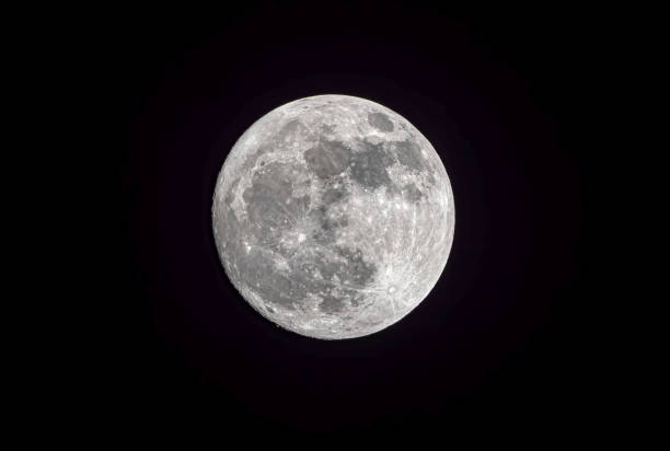 istock Close up Full moon Isolated on Dark Sky in Thailand 1187321877