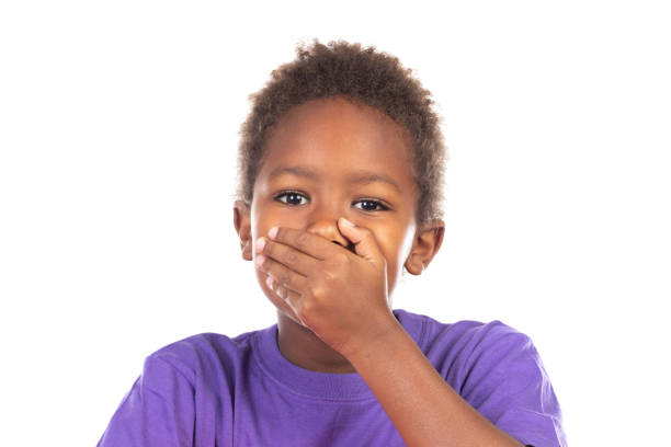 istock Surprised child covering his mouth 1187323688
