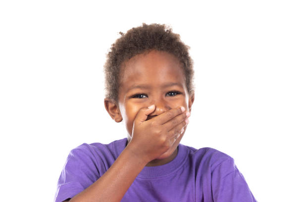 istock Surprised child covering his mouth 1187323693