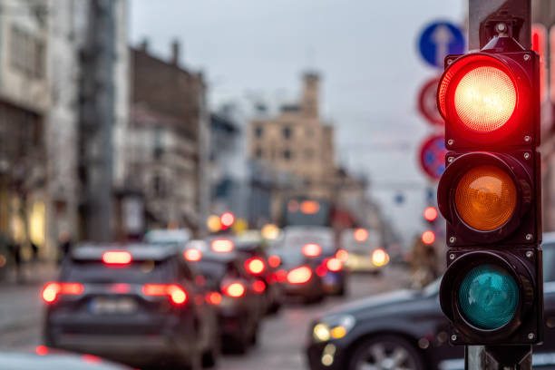 istock A city crossing with a semaphore. Red light in semaphore 1187323982