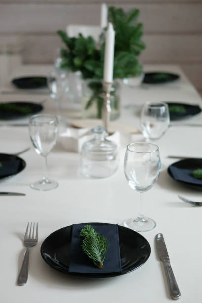 istock Table served for Christmas dinner in living room, close up view 1187325352
