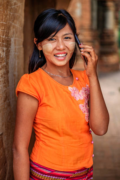 istock Young Burmese girl using mobile in Bagan, Myanmar 1187325621