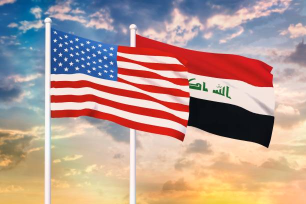 Relationship between the USA and the Iraq Relationship between the USA and the Iraq. Two flags of countries on heaven with sunset. 3D rendered illustration. iraqi flag stock pictures, royalty-free photos & images