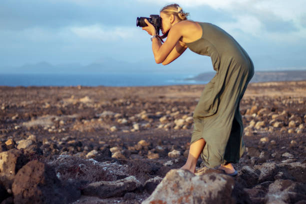 istock Taking sunset photos  on deserted island 1187327119