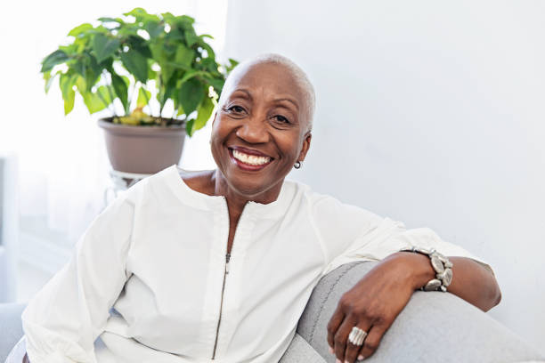 istock Senior Woman Relaxing on a Couch 1187328169