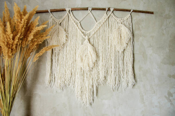 istock macrame wall decoration concrete, natural handmade, design for hallway and bedroom 1187329581