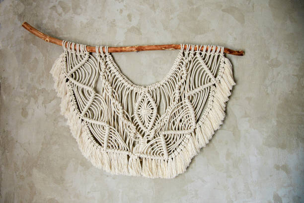 istock macrame wall decoration concrete, natural handmade, design for hallway and bedroom 1187329584