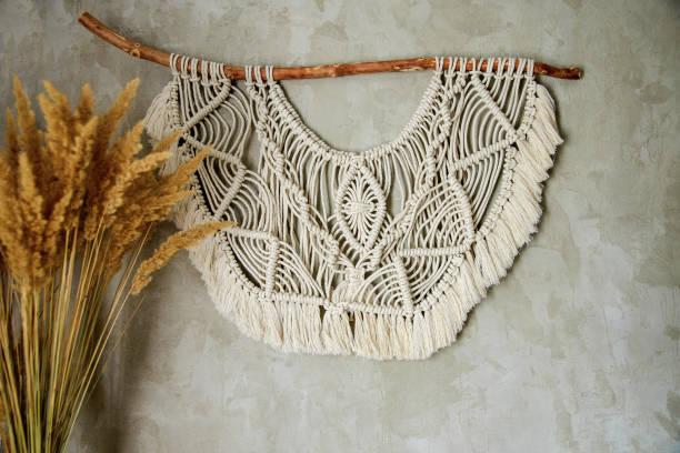 istock macrame wall decoration concrete, natural handmade, design for hallway and bedroom 1187329625