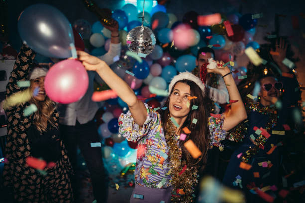 istock Happy friends celebrating New Year 1187330147