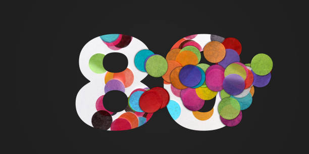 istock 80 number eighty, graphic colorful digit and creative typography with many colourful wheels, confetti on black background. 80s music party. 1187331043
