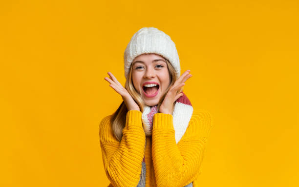 istock Excited girl shouting over yellow studio background 1187331199