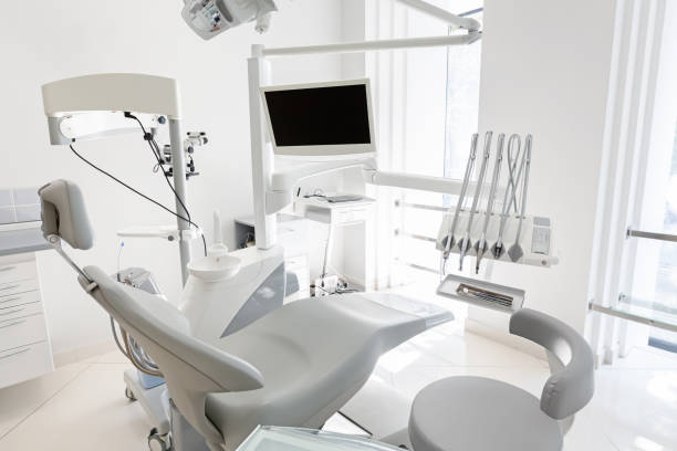 istock Modern empty dental chair with dental equipment 1187331420