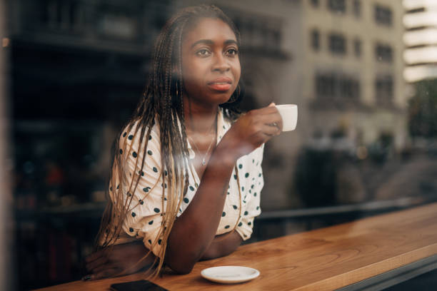 istock Young woman  at the cafe 1187331957