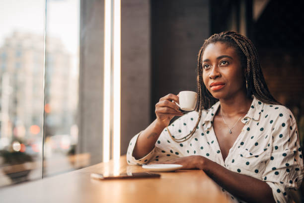 istock Young woman  at the cafe 1187332591