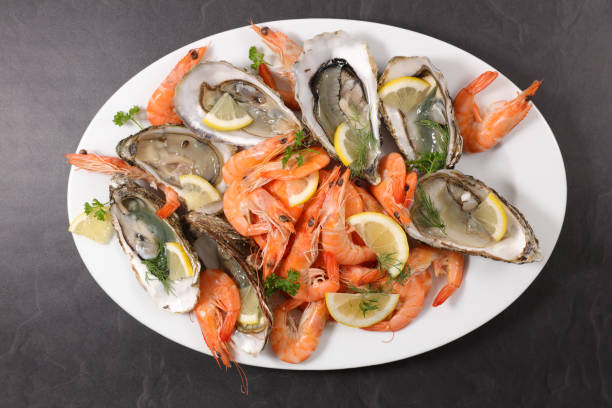 istock shrimp, oyster and clam, top view 1187335109