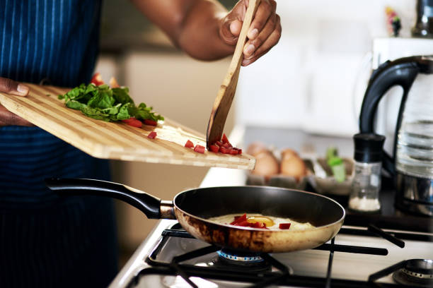 istock He's quite a good cook himself 1187337179