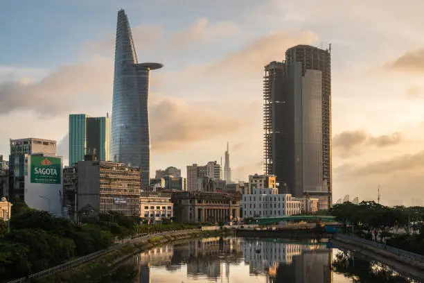 Photo of City Skyline of Ho Chi Minh cityscape at Sunset, Bitexco Tower in the financial area riverside. Saigon, Vietnam