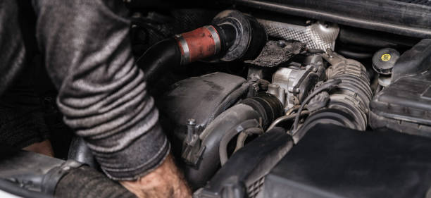 Auto Mechanic Change the Machine Part in the Car