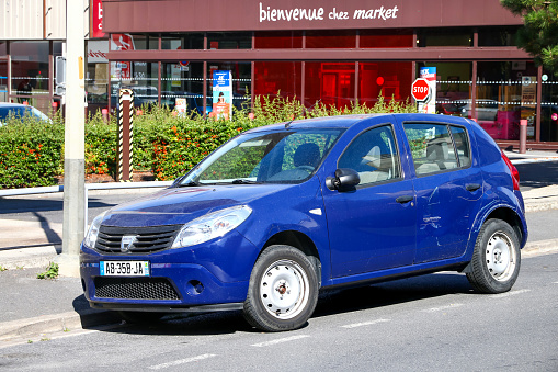 Reims, France - September 16, 2019: Blue hatchback Dacia Sandero in the city street.