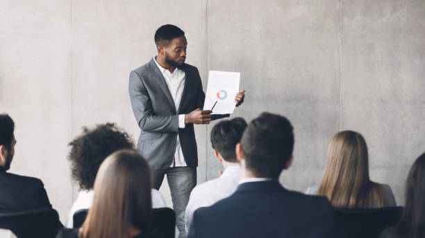 istock Financial manager making presentation, showing diagram, free space 1187340481