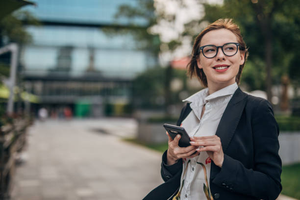 istock Businesswoman using a mobile phone 1187341643