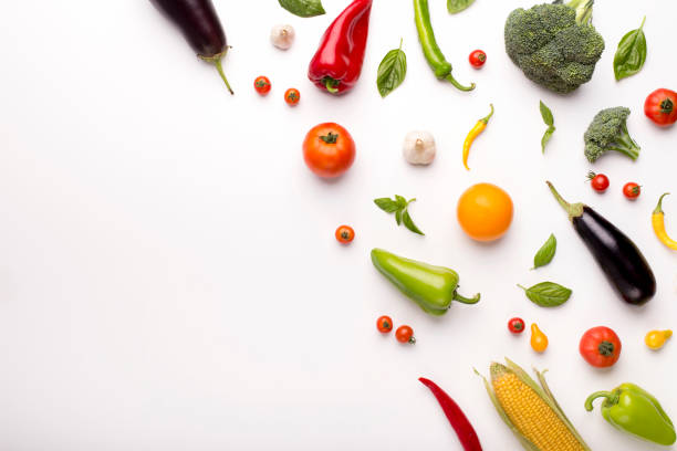 istock Creative flat lay of fresh vegetables on white background 1187342731