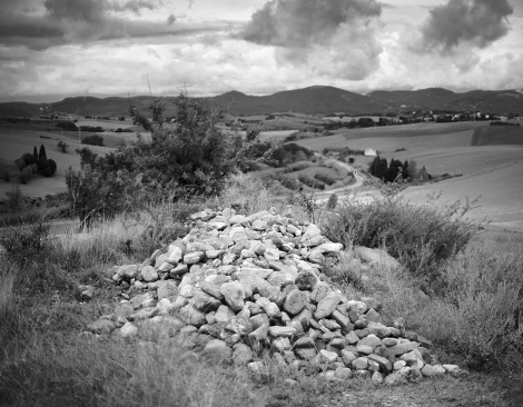 heap of rocks in the countryside around Orciano Pisano, Tuscany